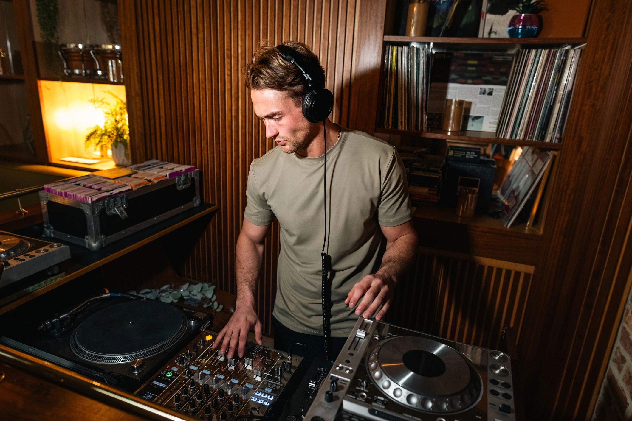 DJ focused on mixing music